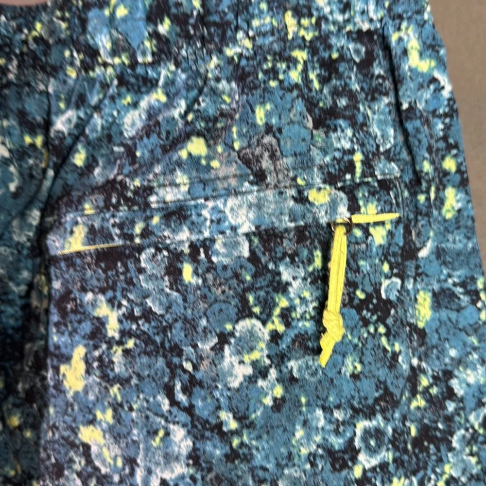 The North Face Blue and Yellow Athletic Shorts size medium‎